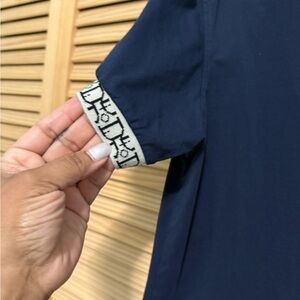 New Navy Blue Short Sleeve Top with Logo Detail. Inspired D